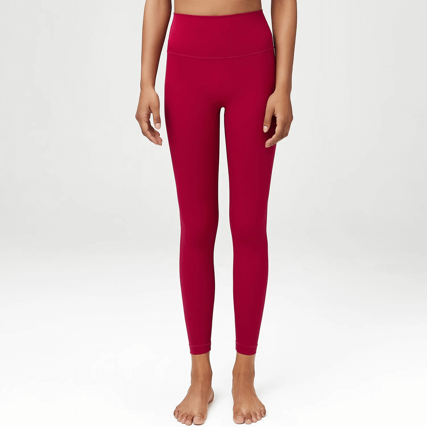 Stylish high-waist elastic red yoga leggings for women, perfect for gym, running, or casual wear, made from durable LYCRA fabric.
